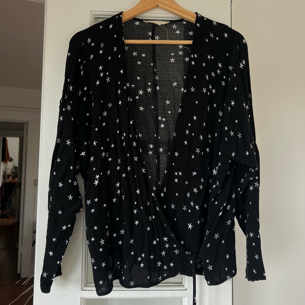 Black long sleeve wrap top with white hand drawn star print - size large